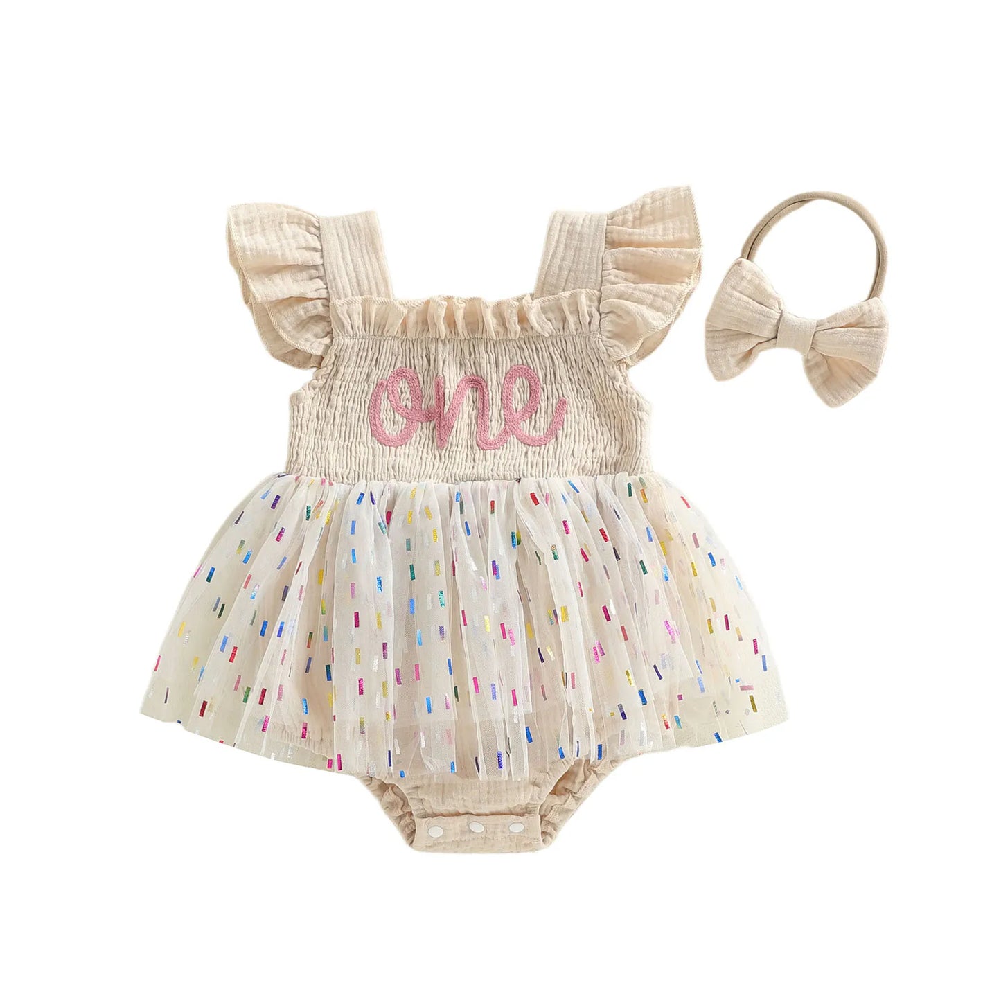 Cream baby girl 1st birthday confetti tutu romper with matching elastic bow headband.