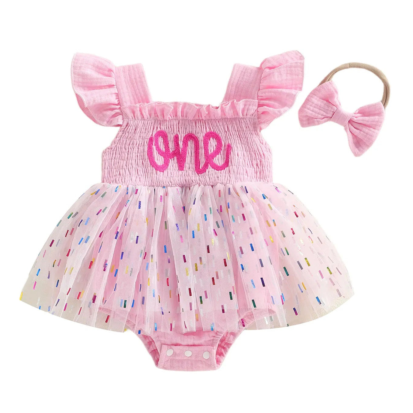 Baby girl 1st birthday pink confetti tutu romper outfit paired with a matching bow headband.