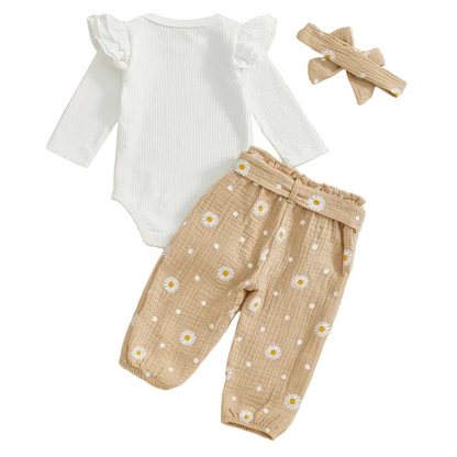 3-piece baby girl daisy print clothes set in taupe, featuring a white long-sleeve ruffle bodysuit, floral pants, and matching headband.