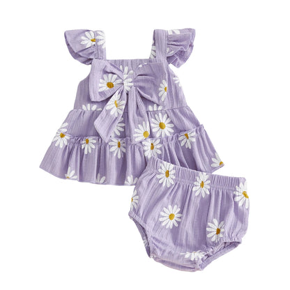 Kidsely infant girl Muted Lavender purple daisy print matching set with decorative bow top and elastic waist shorts.
