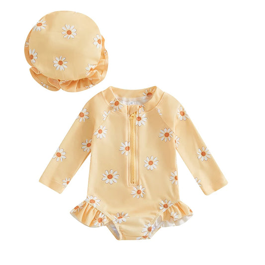Yellow one-piece baby girl long sleeve rash guard swimsuit with white daisy floral print and matching ruffle sun hat.