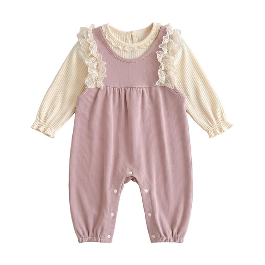 Two-piece baby girl outfit flat lay featuring a dusty pink ribbed lace ruffle suspender romper and cream long-sleeve top