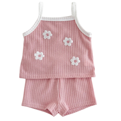 Front view flat lay of the dusty rose 2-piece baby girl summer set featuring a sleeveless ribbed tank top with white 3D loop flower embroidery and matching knit shorts.