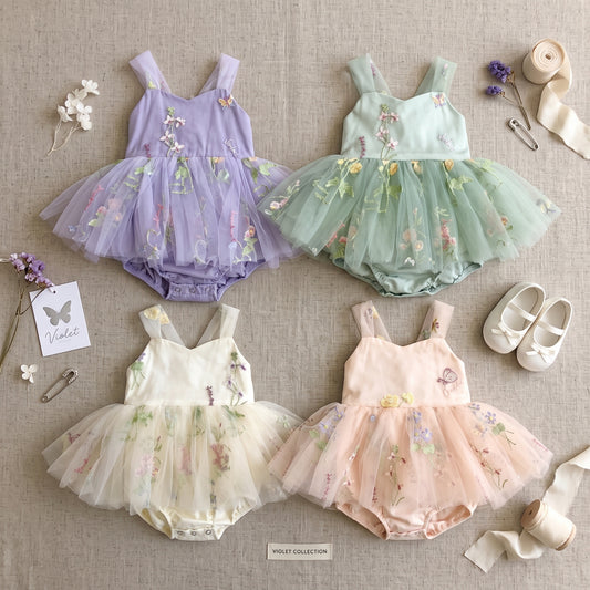 Baby girl fairy tulle tutu romper dresses in lavender, sage green, ivory, and pink.
