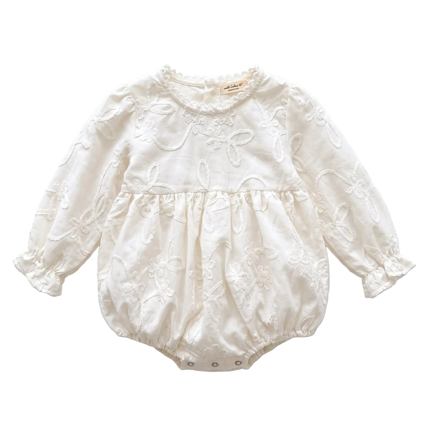 White baby girl long sleeve floral embroidered bubble romper displayed on a clean white background.