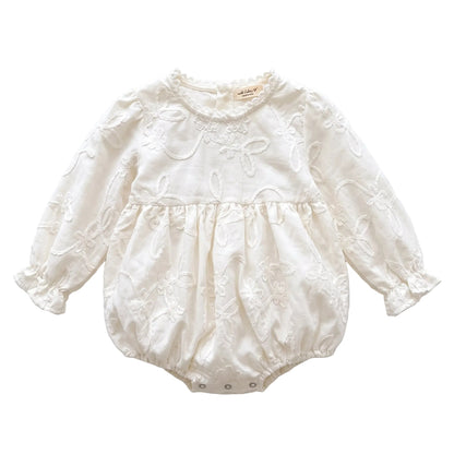 White baby girl long sleeve floral embroidered bubble romper displayed on a clean white background.