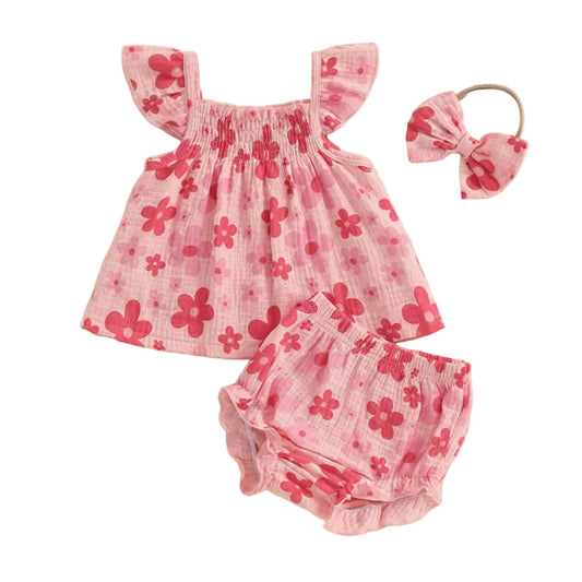 3-piece infant and toddler baby girl summer outfit set featuring a pink floral print fly sleeve tank top, matching ruffled bloomers, and a bow headband on a neutral background.