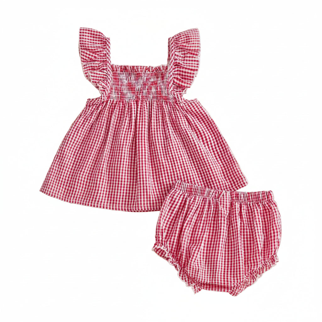 Full back flat lay view of the red and white checkered smocked top and coordinating diaper cover bloomers for infants and toddlers.
