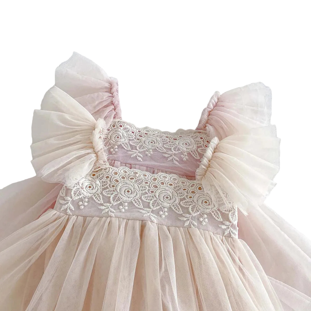 Close-up detail of white floral lace bodice and ruffle tulle flutter sleeves on baby dress