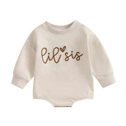 Clean flat lay of the long-sleeve infant bubble romper with brown Lil Sis graphic text.