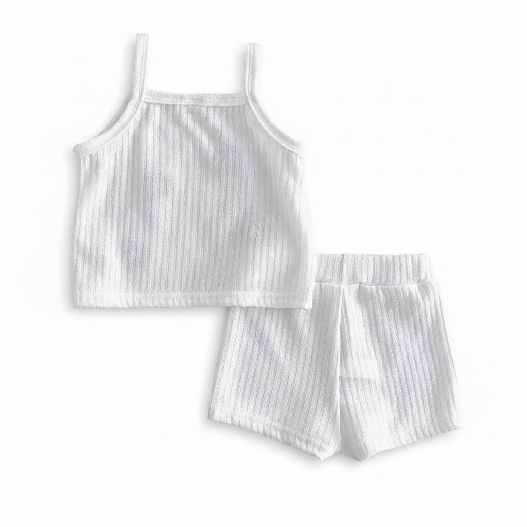 Flat lay arrangement showcasing the back view of the marshmallow white sleeveless ribbed top and coordinating baby shorts.