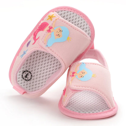 Top-down view of light pink baby girl mermaid sandals showing the inner mesh lining and toe design.