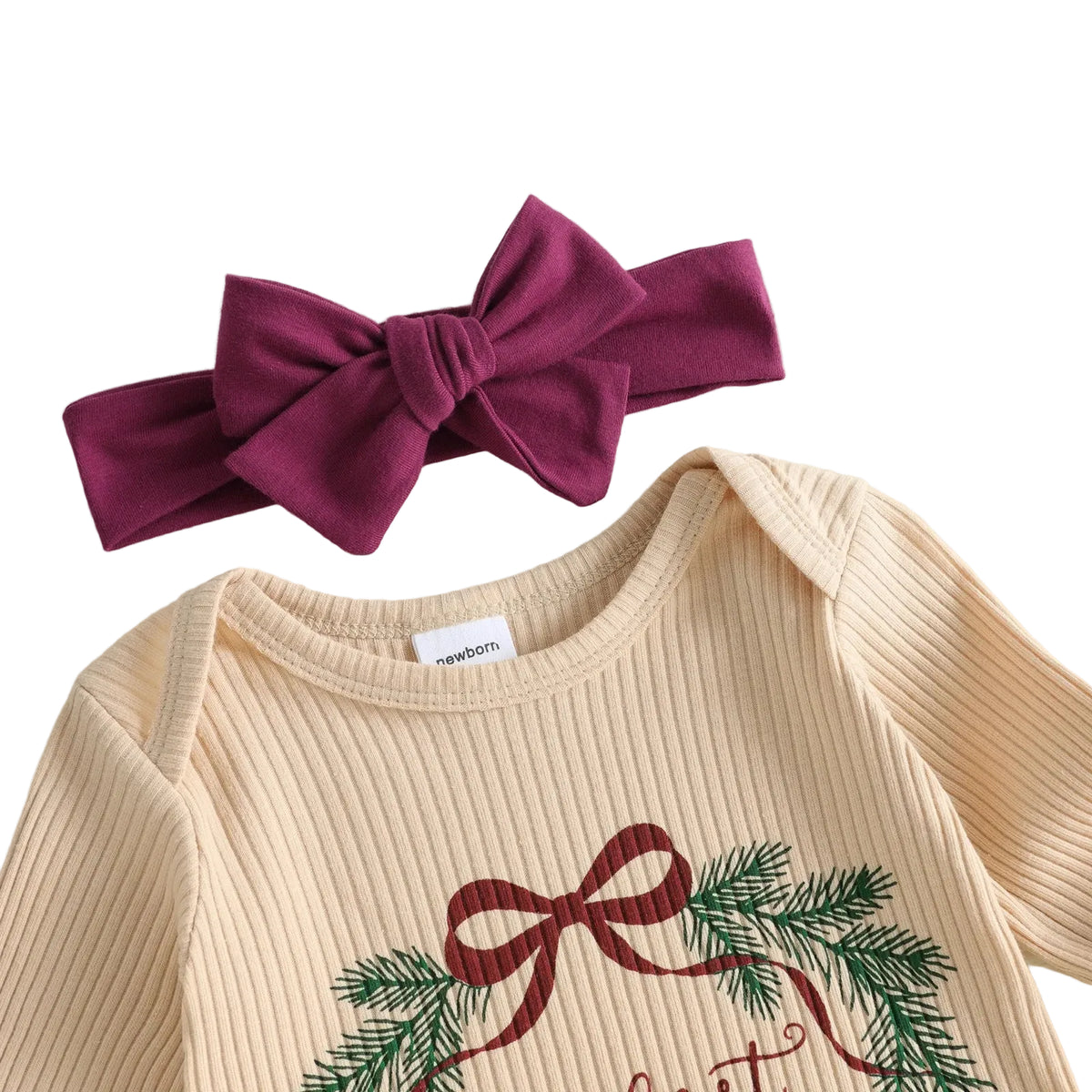 Close-up of ribbed baby romper collar, wreath embroidery, and matching burgundy bow headband