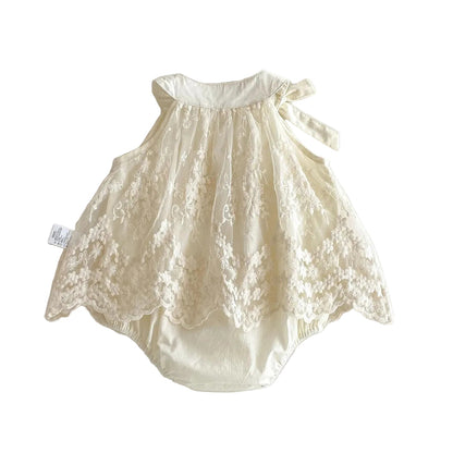 Clean back view flat lay of the sleeveless Pearl Ivory lace romper dress on a white background, highlighting the flowy A-line silhouette.