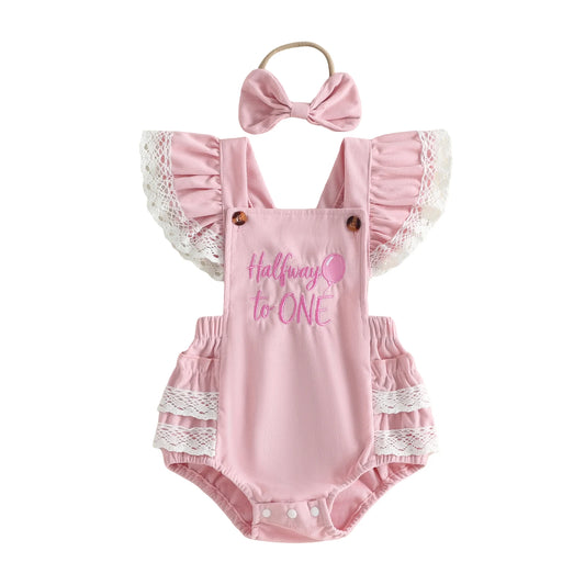 Pink baby girl "Halfway to One" 6-month birthday romper outfit with matching bow headband, featuring lace ruffle sleeves.