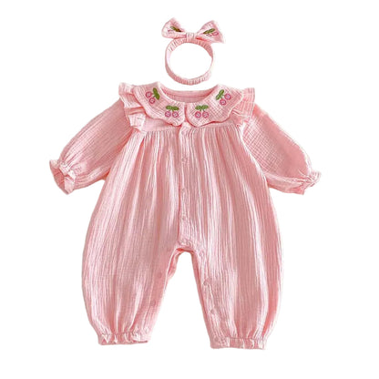 Kidsely baby girl pink cotton blend muslin long sleeve bubble romper and matching bow headband set on a white background.