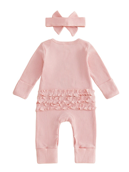 Back view flat lay of baby girl pink ribbed romper showing the ruffle butt design and matching headband on a white background.