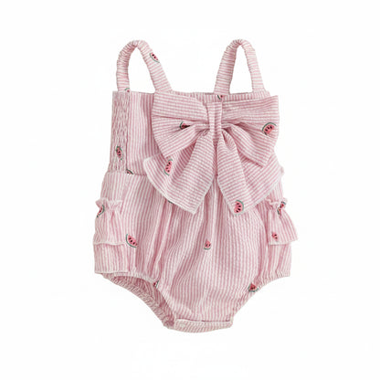 A full-length front view studio shot of the baby girl watermelon print romper on a white background.