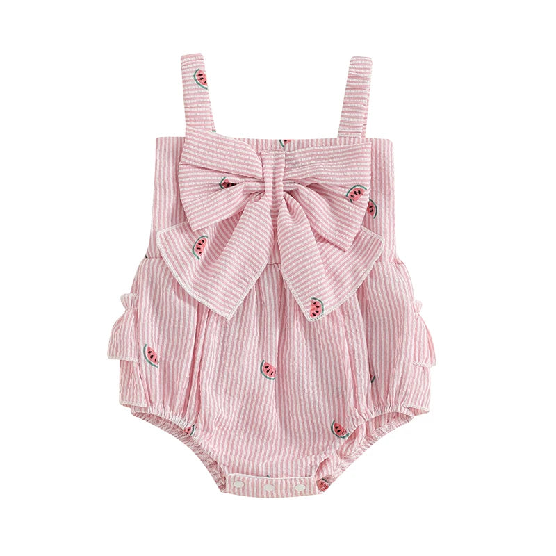 Baby girl pink and white striped seersucker romper featuring a watermelon fruit print, oversized front bow, and three-tier ruffle butt detail on a clean white background.