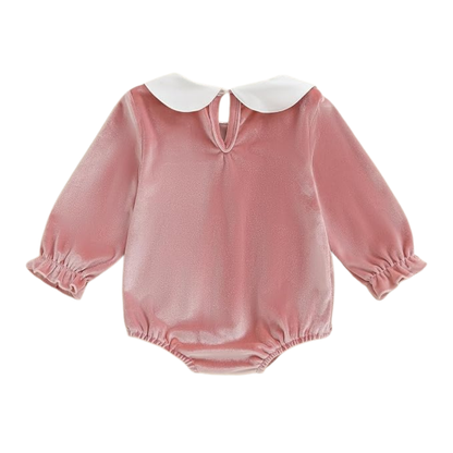 Back view of baby girl pink velvet bubble romper showing white collar, keyhole closure, and elastic leg openings