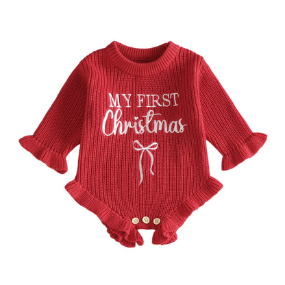 Red baby girl My First Christmas long sleeve knit sweater romper with ruffle trim and white embroidered lettering on a white background.