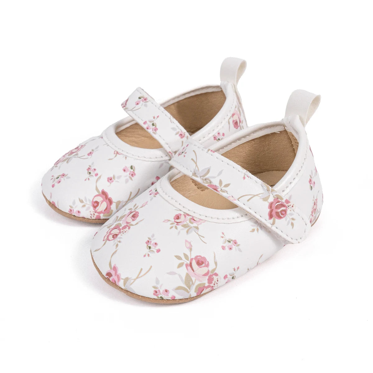 White baby girl Mary Jane shoes with pink vintage rose floral pattern and adjustable strap.