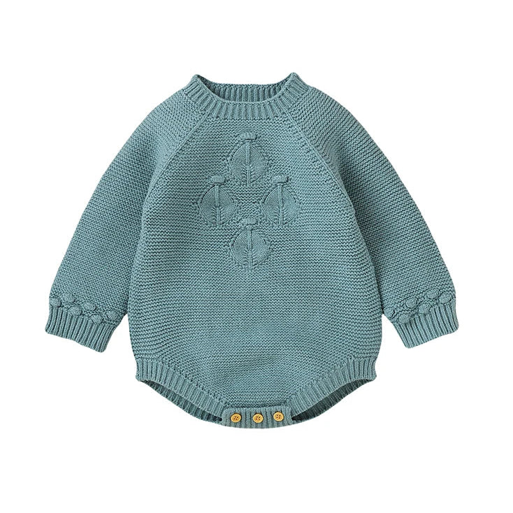 Teal baby girl seamless textured knit sweater romper featuring long sleeves and bottom crotch fasteners.