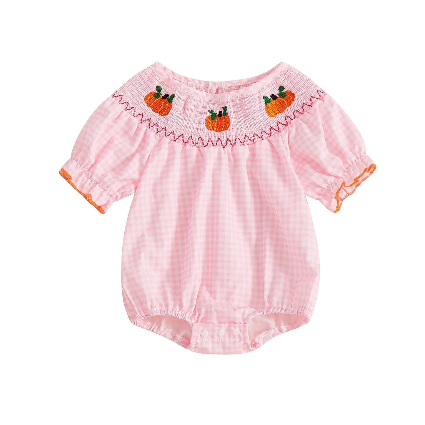 Pink smocked gingham baby romper with embroidered pumpkins across the neckline.