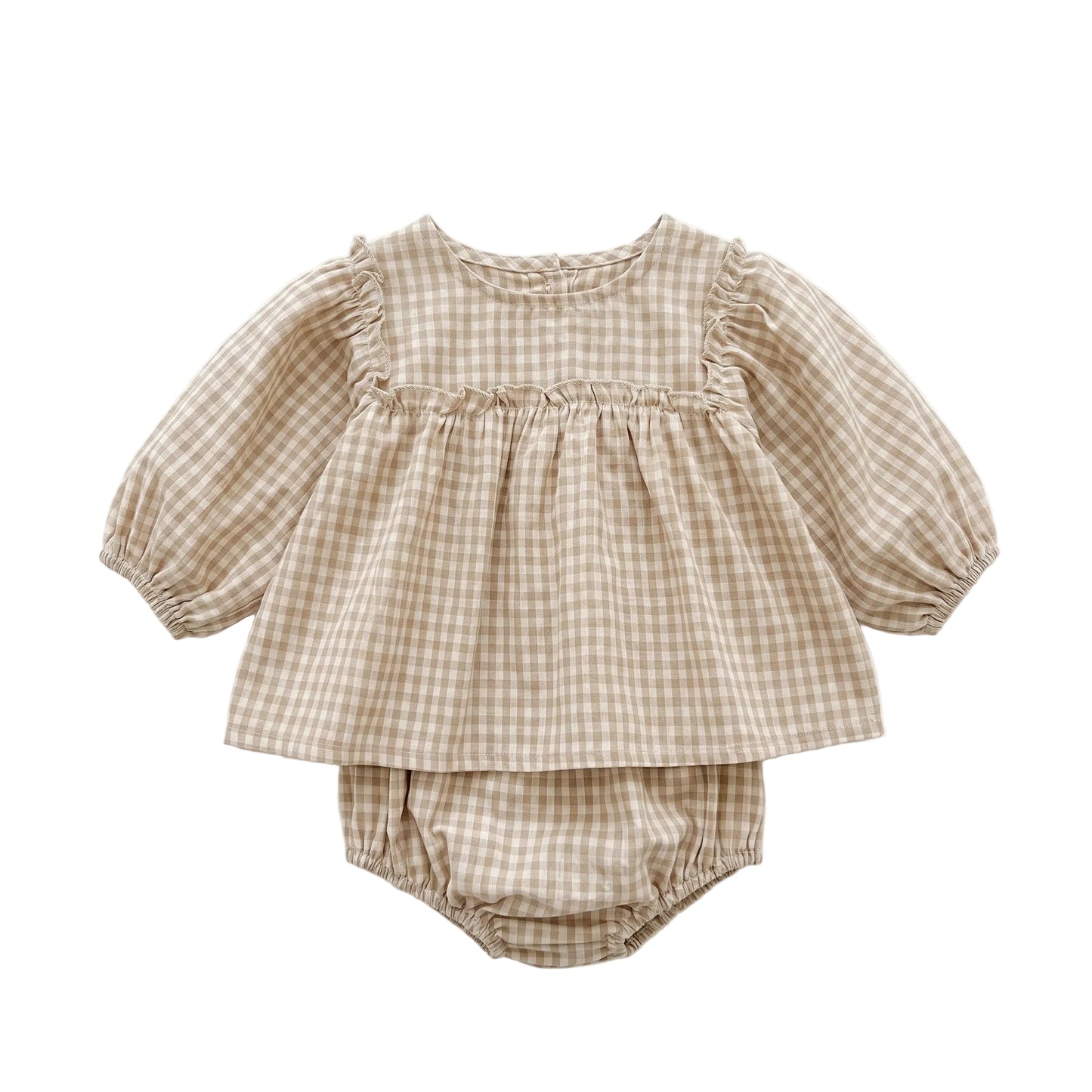 Baby girl smocked long sleeve beige gingham peplum top and matching bloomers set isolated on white background.