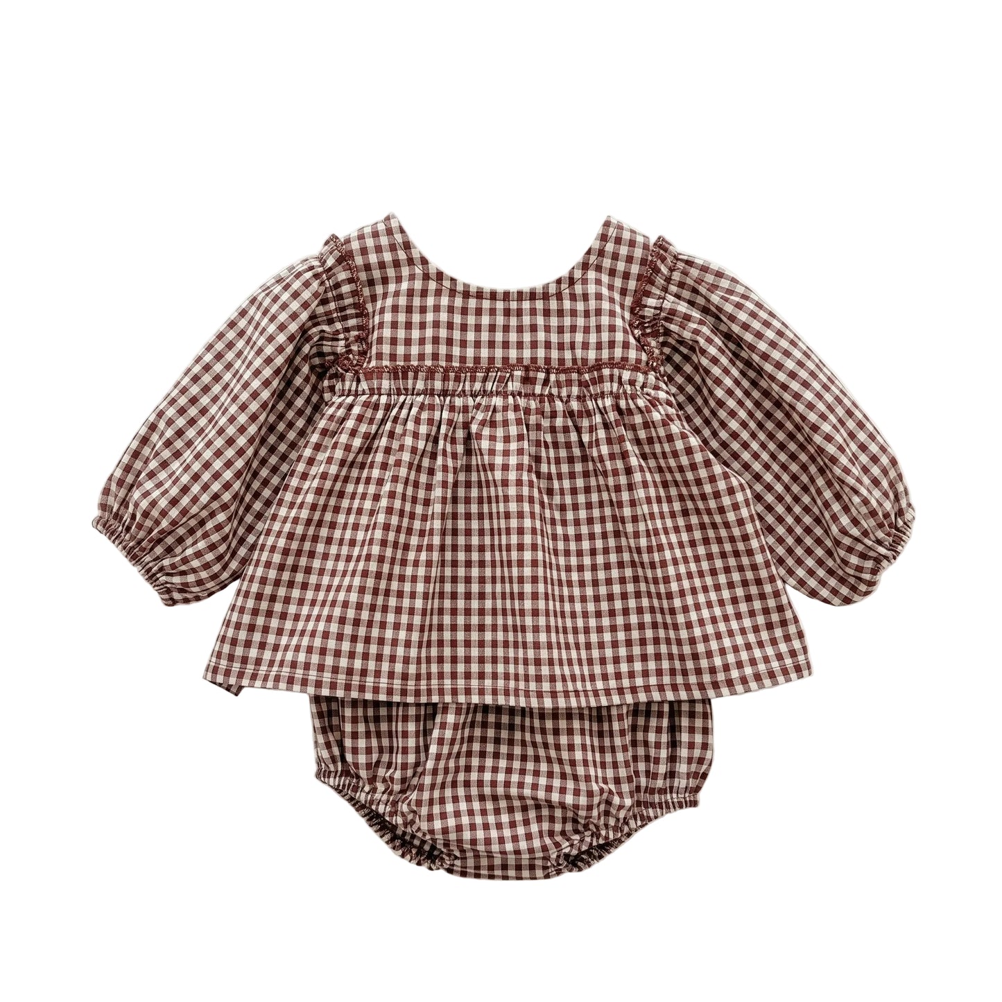 Baby girl smocked long sleeve brown gingham peplum top and matching bloomers set isolated on white background.