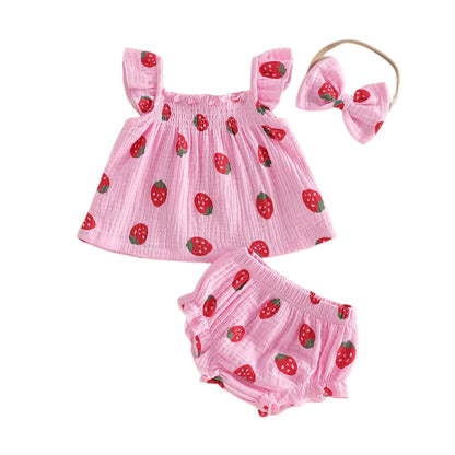 Baby girl 3-piece summer outfit featuring a light pink strawberry berry print babydoll top, ruffle bloomers, and matching bow headband.
