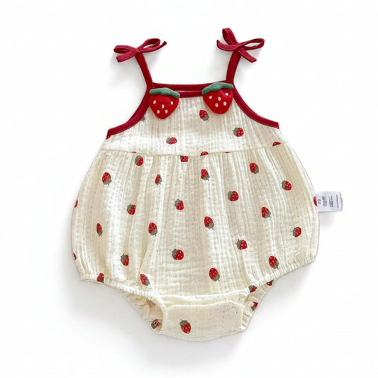 Sleeveless cream baby girl romper featuring an all-over strawberry print and 3D plush strawberry appliques on a clean white background.