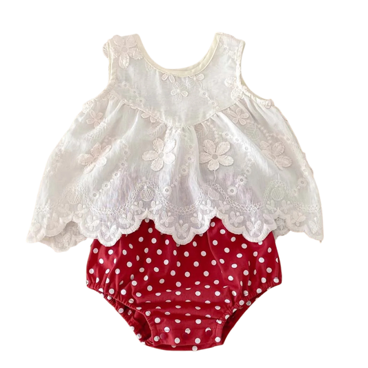 Two-piece baby girl summer outfit featuring a white sleeveless tunic top with 3D floral embroidery and scalloped hem paired with red and white polka dot bloomers.