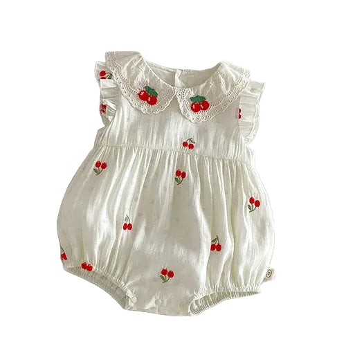 Front view of a baby girl vintage cherry embroidered bubble romper in antique cream cotton muslin on a clean white background.