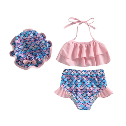 Baby girl 3-piece swimsuit set with vibrant pink watermelon print, tiered ruffle halter top, and matching watermelon swim cap.