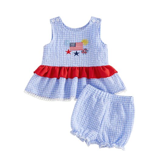 Baby girls 4th of July outfit featuring a blue gingham seersucker tank top with flag embroidery and matching bloomer shorts.