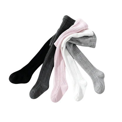 5-pack of baby and girls cable knit tights in black, dark gray, soft pink, crisp white, and light gray laid out together.