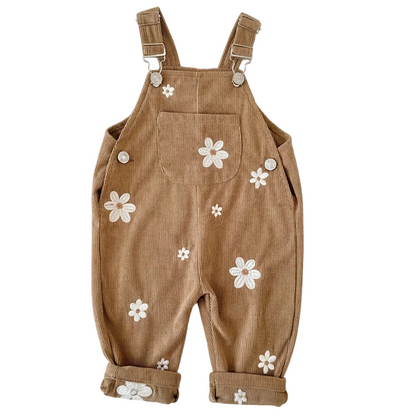 Acorn Brown baby and toddler girls corduroy overalls featuring white daisy embroidery.