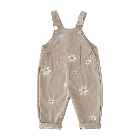 Oatmeal Beige baby and toddler girls corduroy overalls featuring white daisy embroidery.