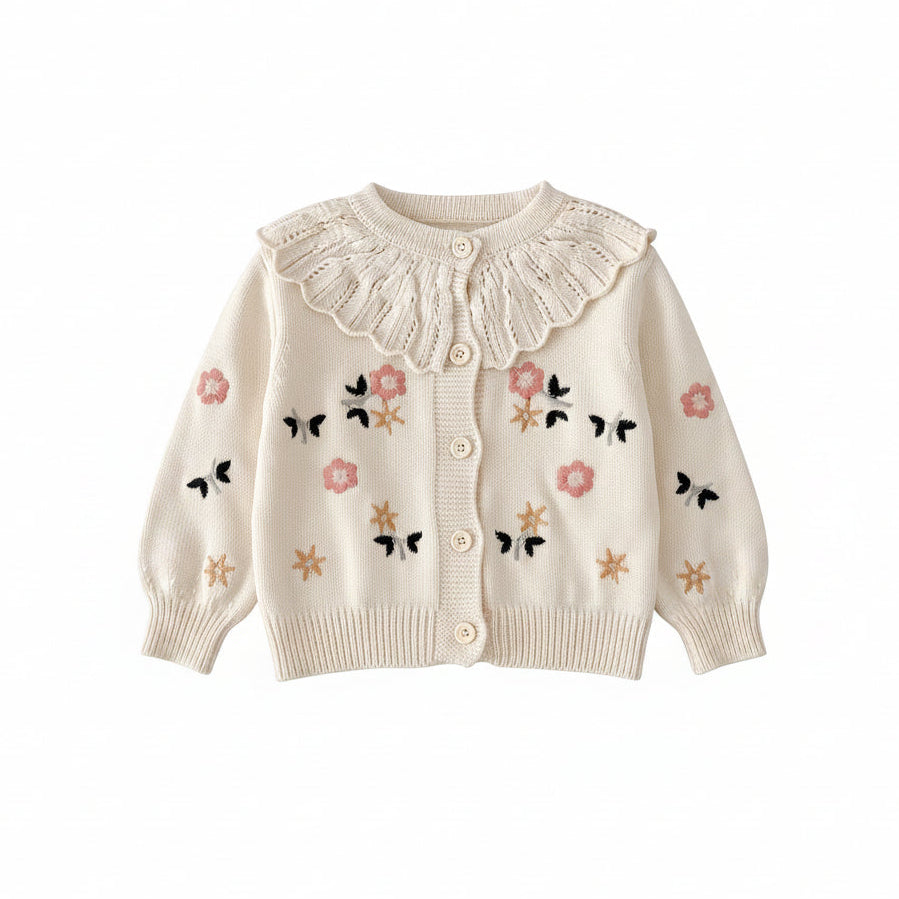 Front view of cream baby girls cardigan sweater featuring floral and butterfly embroidery with a scalloped ruffle collar.