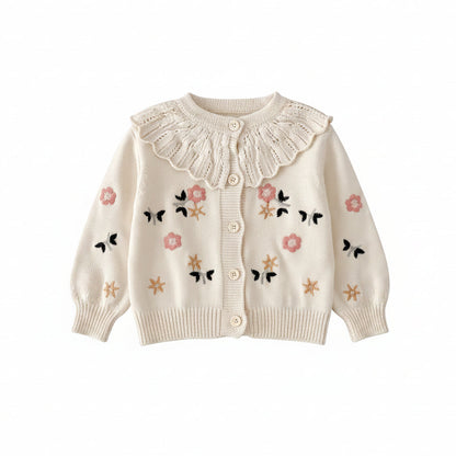 Front view of cream baby girls cardigan sweater featuring floral and butterfly embroidery with a scalloped ruffle collar.
