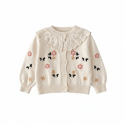Front view of cream baby girls cardigan sweater featuring floral and butterfly embroidery with a scalloped ruffle collar.