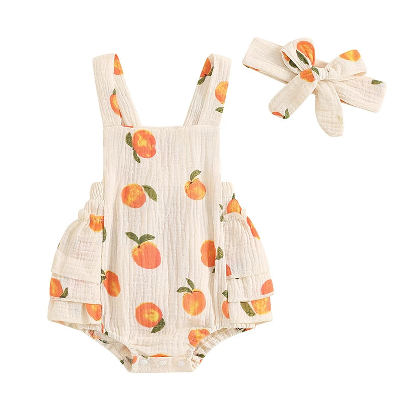 Baby girls sleeveless peach print summer romper and matching bow headband set shown against a white background.