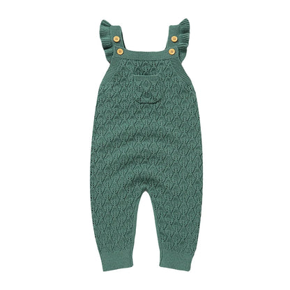 Baby girls green chunky knit sleeveless romper overalls with ruffle straps and a front pocket, laying flat on a white background.