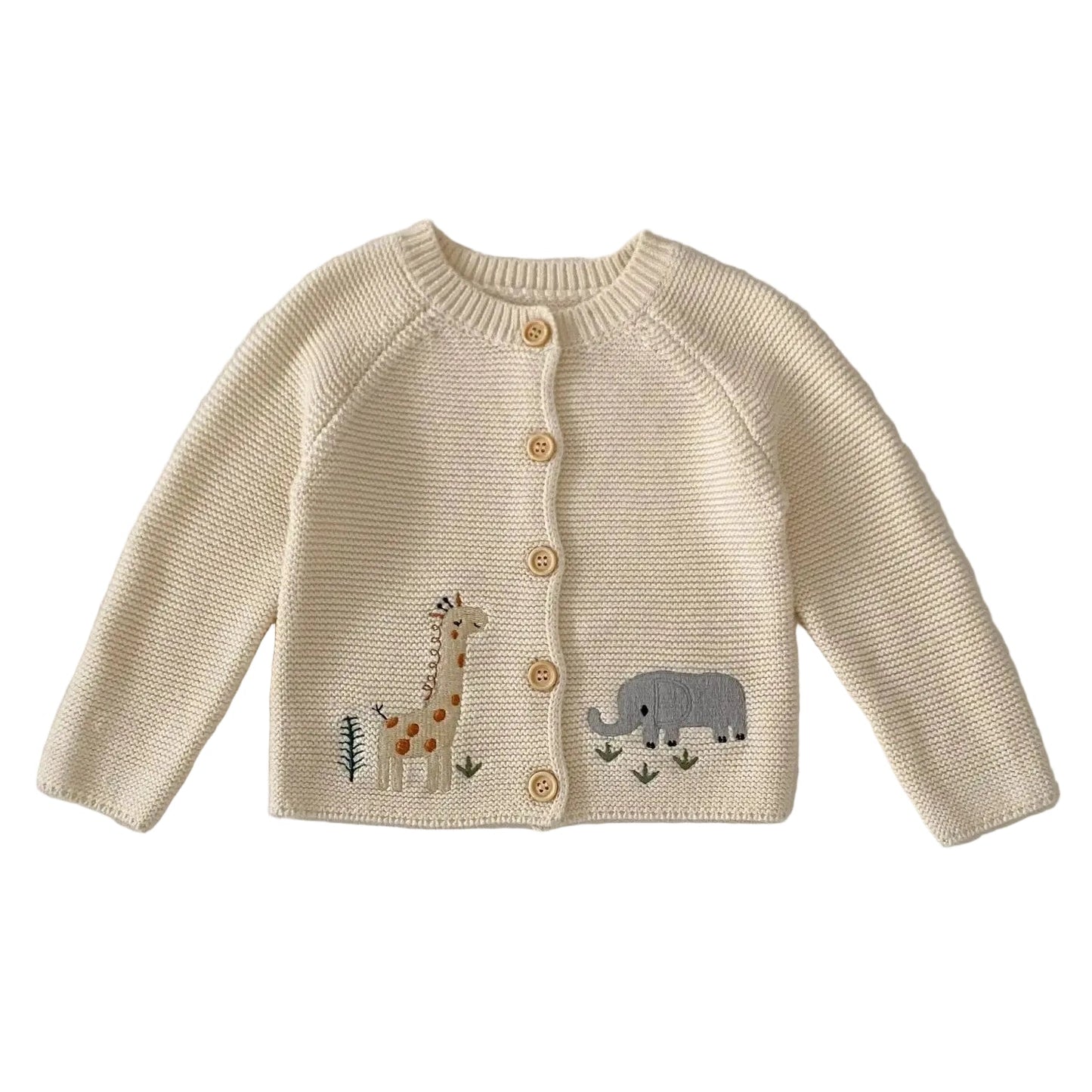 Front view of a cream-colored unisex baby knit cardigan sweater with giraffe and elephant embroidery and wooden buttons on a clean white background.
