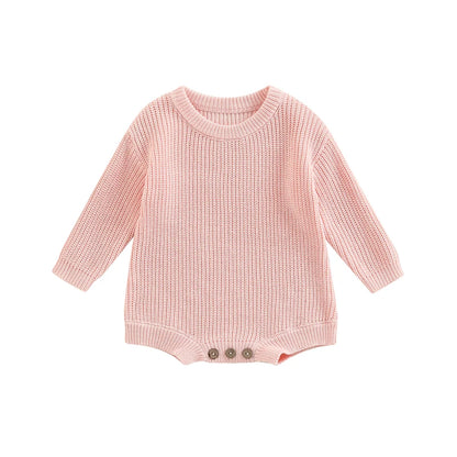 Unisex baby ribbed cotton blend knit sweater romper in blush pink.