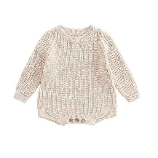Baby boy and girl ribbed cotton blend knit sweater romper in cream neutral tone with long sleeves.