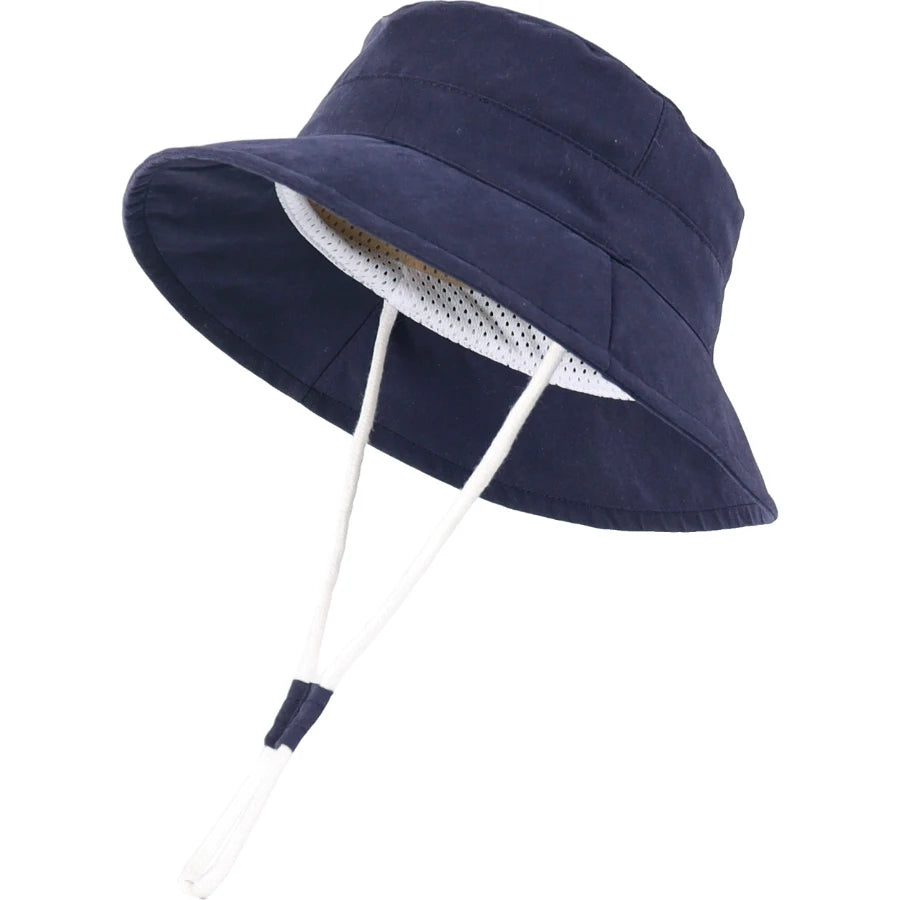 Dark blue baby and toddler wide brim bucket hat showing white adjustable chin strap and breathable mesh lining.