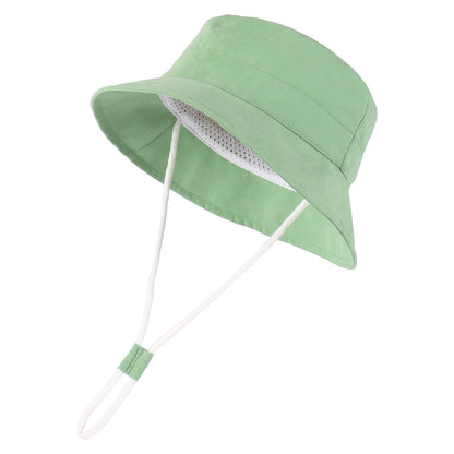 Green baby and toddler wide brim bucket sun hat with adjustable chin strap.