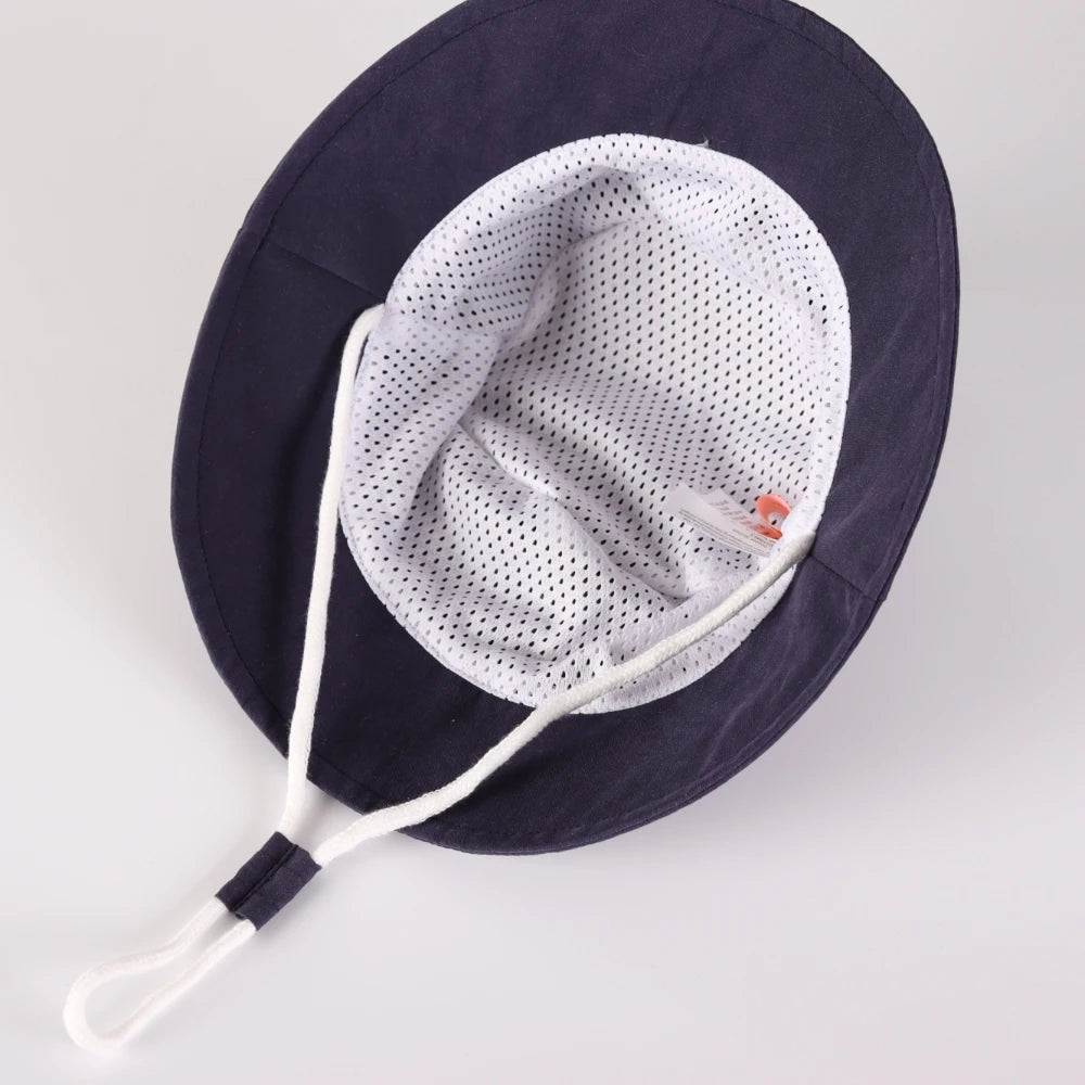 Inside view of the baby sun hat showing the white breathable cooling mesh lining and adjustable head strap.